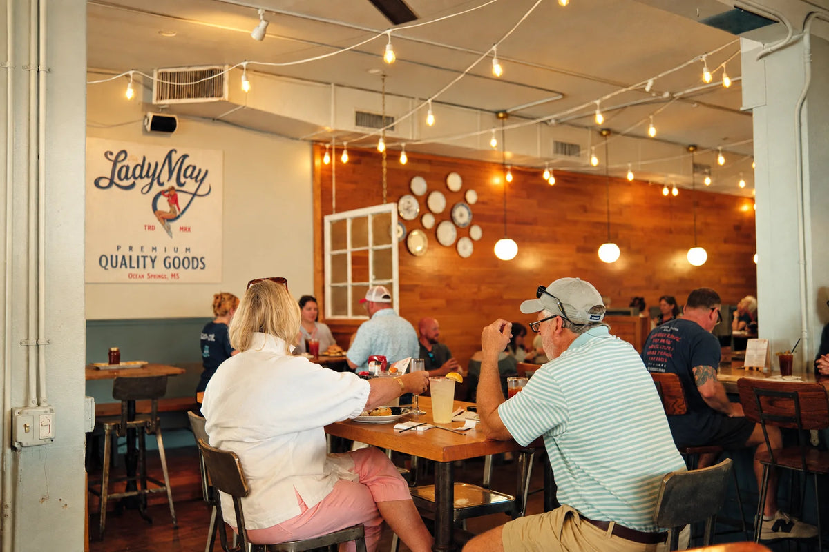 Guests dining inside The Lady May restaurant in Ocean Springs