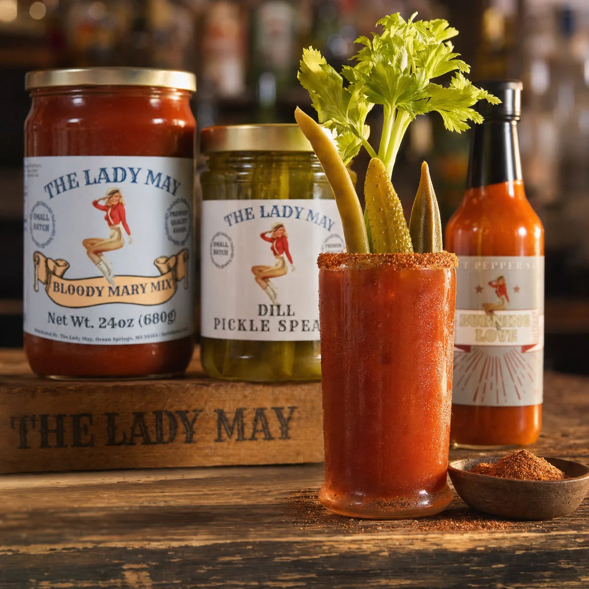 The Lady May garnished Bloody Mary cocktail made with Bloody Mary mix, pickle spears and hot sauce