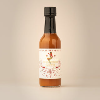 The Lady May Burning Love original pepper hot sauce bottle, a gourmet small-batch farm-to-table Southern hot sauce gift idea