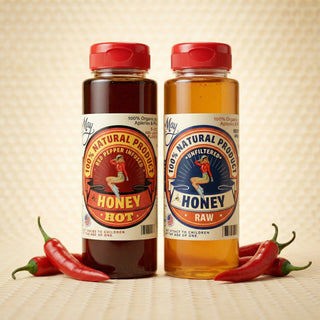The Lady May raw unfiltered honey and hot red pepper infused honey bottles with chili peppers, a gourmet farm-to-table local honey with natural benefits
