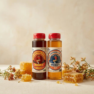 The Lady May raw unfiltered and hot honey bottles with honeycomb and dried wildflowers, a gourmet farm-to-table local honey with natural benefits